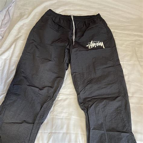 stussy trackies.